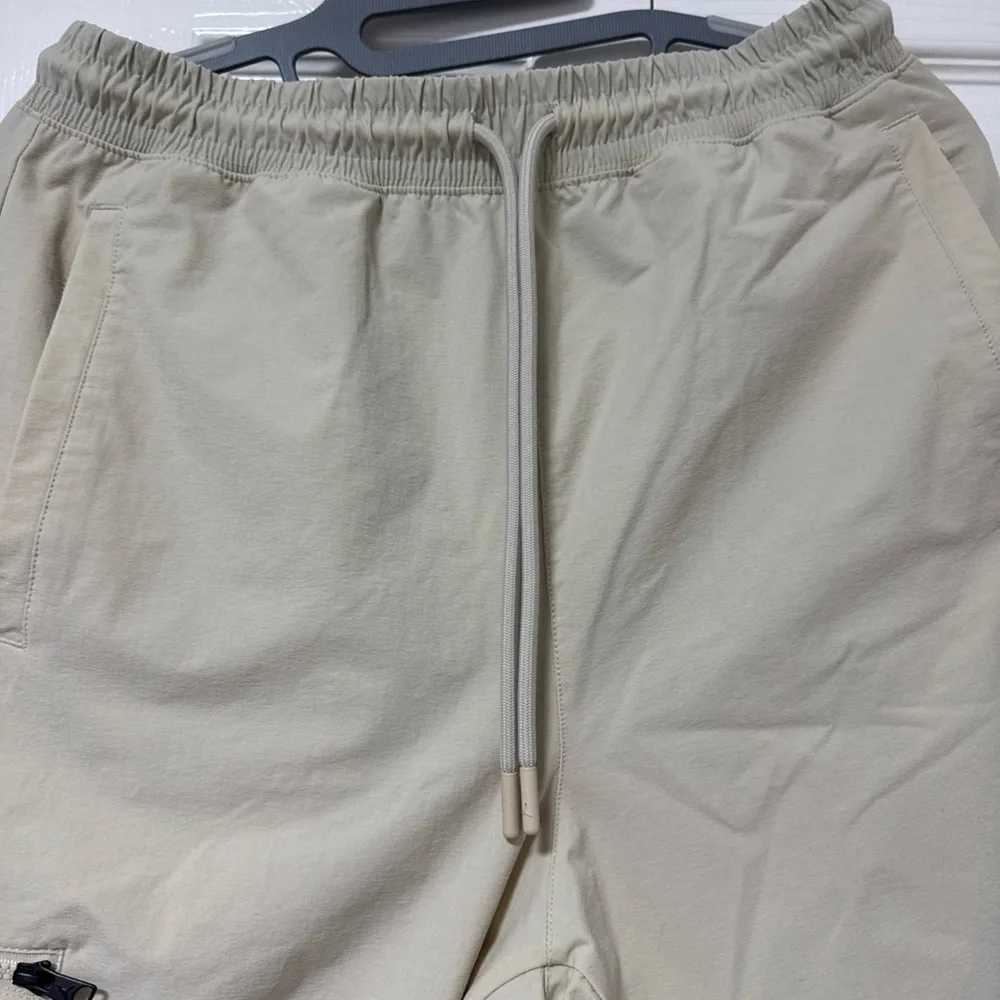 Jordan Men's Joggers in Beige with Black Jumpman A-11